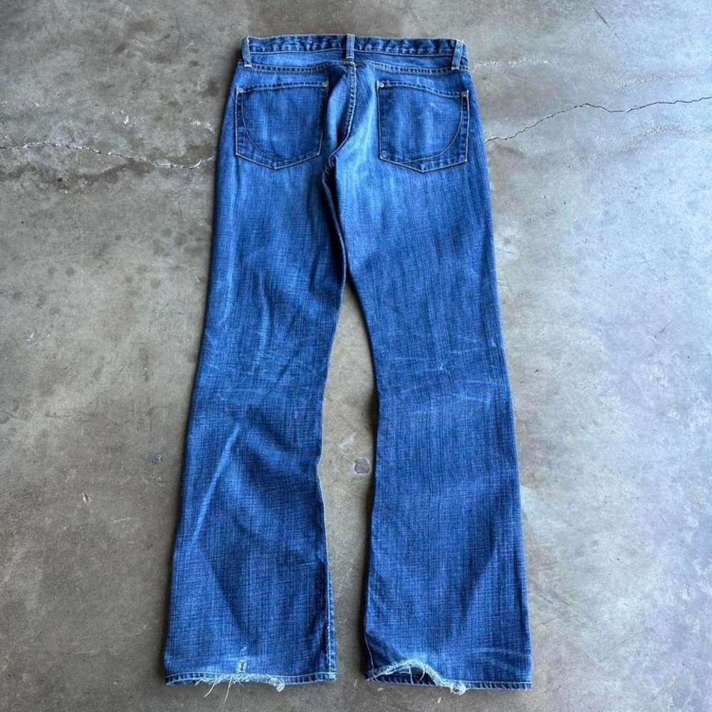 Vintage Y2K grunge paper denim and cloth boot cut jeans